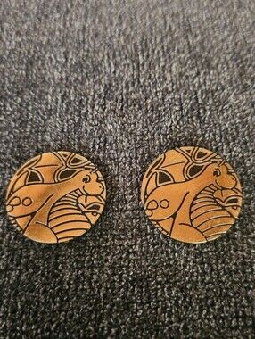 Pokemon Trading Card Game collector coins featuring Dragonite